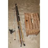 THREE FISHING RODS TOGETHER WITH A WICKER FISHING BOX (SIGNS OF WOODWORM)