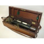 A CASED VINTAGE KEYZOR AND BENDON MILITARY STYLE COMBINATION TELESCOPE AND COMPASS WITH SPIRIT