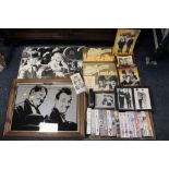 A QUANTITY OF LAUREL AND HARDY RELATED COLLECTABLES TO INCLUDE POSTERS, WALL MIRROR AND VHS TAPES