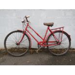 A VINTAGE 1950s THREE SPEED TRIUMPH LADIES BICYCLE PAINTED RED