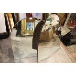 THREE MIRRORS TO INCLUDE AN ARCHED TOPPED WALL MIRROR, SHIELD SHAPED DRESSING TABLE MIRROR ETC