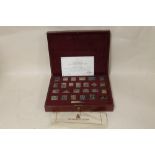 A CASED SET OF HALLMARKED SILVER 'THE EMPIRE COLLECTION' STAMPS