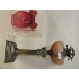 AN ANTIQUE COLUMN OIL LAMP WITH FRILLED PINK GLASS SHADE AND PINK GLASS FONT OVERALL HEIGHT