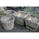 A PAIR OF CELTIC DESIGN STONE PLANTERS TOGETHER WITH A PAIR OF BRICK EFFECT STONE PLANTERS (4)