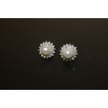 A PAIR OF UNMARKED DIAMOND AND FAUX PEARL EARRINGS