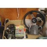 A TRAY OF COLLECTABLES TO INCLUDE A VINTAGE STEERING WHEEL, CAMERA ETC