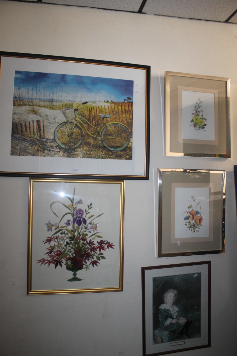 A BICYCLE JIGSAW PICTURE TOGETHER WITH FOUR OTHER PICTURES