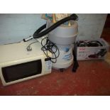 A HOOVER WET & DRY AQUAMASTER, A PANASONIC MICROWAVE, A BOXED AEG RAPID CLEAN STAIR AND CAR HOOVER