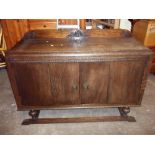 AN OAK VINTAGE SIDEBOARD