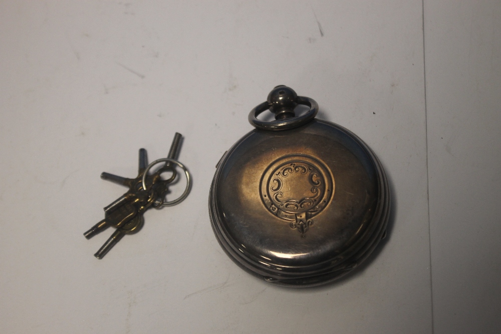 AN OVER SIZED OPEN FACE POCKET WATCH SIGNED TO THE DIAL AND MOVEMENT AND A QUANTITY OF WATCH KEYS - Image 2 of 2