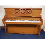 A TEAK PIANO WITH 88 KEYS MADE BY KNIGHT