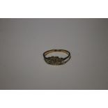 AN 18 CT GOLD LADIES RING SET WITH THREE SMALL DIAMONDS APPROX 2 GRAMS