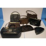 A BLACK LIZARD SKIN HANDBAG of unknown make together with a Meadows brown suede handbag and