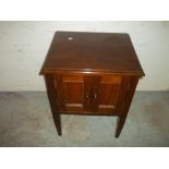 A SMALL HARRIMAN AND BROWN TWO DOOR SIDE CHEST