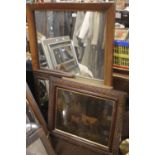 A LARGE FRAMED MIRROR TOGETHER WITH A CATTLE PICTURE AND TWO OTHERS