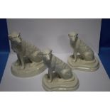 A BELLEEK COLLECTORS SOCIETY IRISH WOLFHOUND TOGETHER WITH A MATCHED PAIR OF SMALLER IRISH