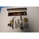 A BOX OF COLLECTABLES TO INCLUDE 7 WATCHES,LIGHTER AND A BRASS CALENDAR