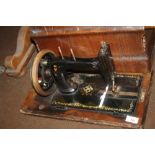 A CASED SEWING MACHINE