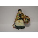 AN EARLY ROYAL DOULTON FIGURINE 'THE OLD LAVENDER SELLER' HN1492