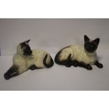 A PAIR OF BESWICK SIAMESE CAT FIGURES