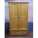 A MODERN OAK DOUBLE WARDROBE WITH LOWER DRAWER, MATCHES LOT 842