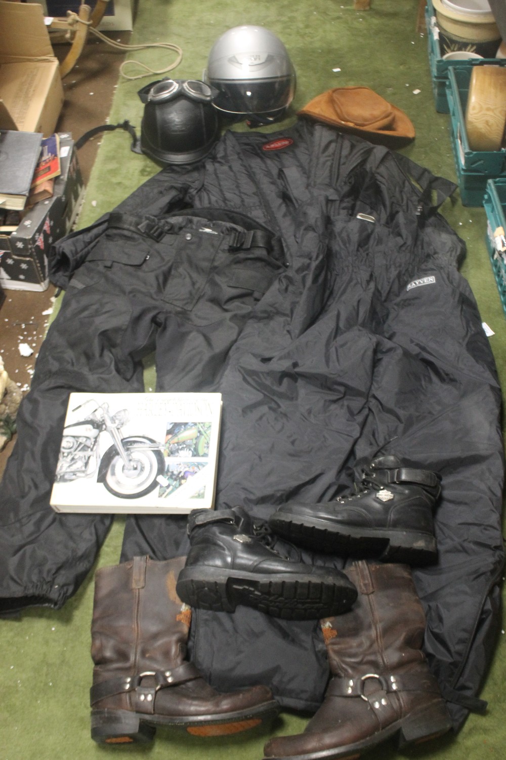 A BOX OF MOTORCYCLE CLOTHING AND HELMETS