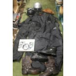 A BOX OF MOTORCYCLE CLOTHING AND HELMETS