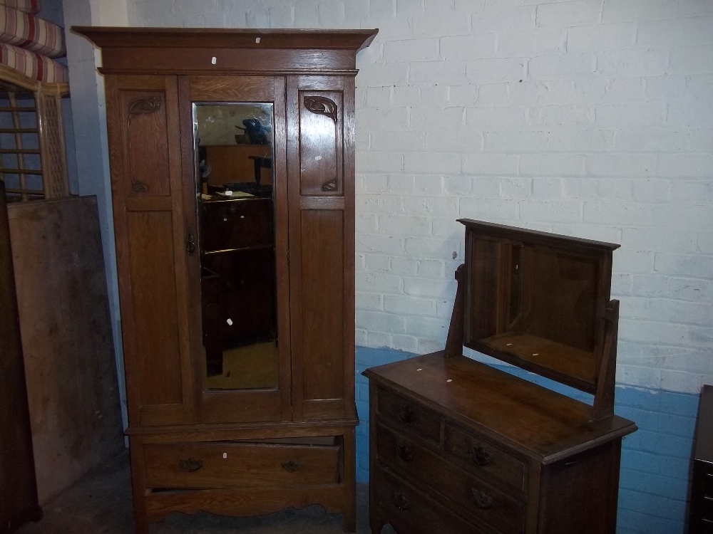 AN EDWARDIAN WARDROBE AND DRESSING TABLE