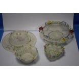A DONEGAL PARIAN CHINA PIERCED HAT TOGETHER WITH THREE SIMILAR BASKETS