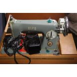 AN ALFA SEWING MACHINE