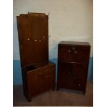 A VINTAGE WALNUT COCKTAIL CABINET AND A VINTAGE OAK HALL COAT / UMBRELLA STAND WITH MIRROR