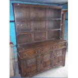 A DARK OAK WELSH DRESSER / SIDEBOARD UNIT