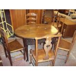 AN ANTIQUE OVAL OAK DINING TABLE AND FOUR CHAIRS