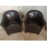 A MATCHING PAIR OF BROWN FAUX LEATHER TUB CHAIRS