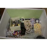 A BOX OF ASSORTED COSTUME JEWELLERY