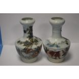 A PAIR OF ORIENTAL VASES, NO MARKS TO BASE - HEIGHT APPROXIMATELY 21.5 cm