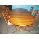 A RETRO PARKER KNOLL EXTENDING TEAK OVAL DINING SET WITH FOUR CHAIRS