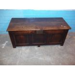 AN OAK PANELLED COFFER / BLANKET CHEST A/F, ONE PANEL DETACHED BUT PRESENT