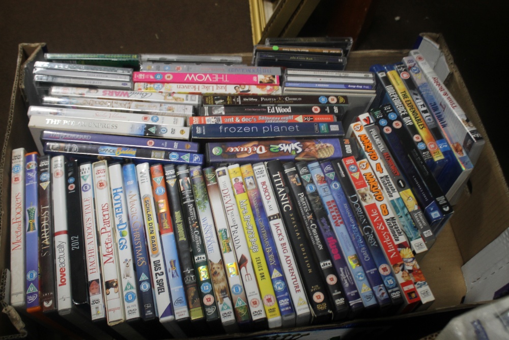 A TRAY OF ASSORTED DVDS (TRAY NOT INCLUDED)