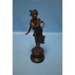 A SPELTER STYLE STATUE ON CIRCULAR PLINTH A/F