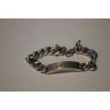 A SILVER CURB LINK IDENTITY BRACELET APPROX 98.4 GRAM