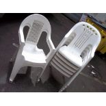 A SELECTION OF STACKABLE WHITE GARDEN CHAIRS