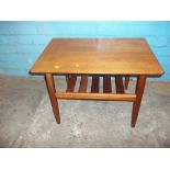 A SMALL TEAK RETRO COFFEE TABLE WITH STRETCHER SHELF