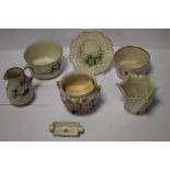 SEVEN BELLEEK ITEMS, TO INCLUDE AN UNUSUAL THREE LEGGED POT, JUG, PLATE, THREE BOWLS ETCALL WITH