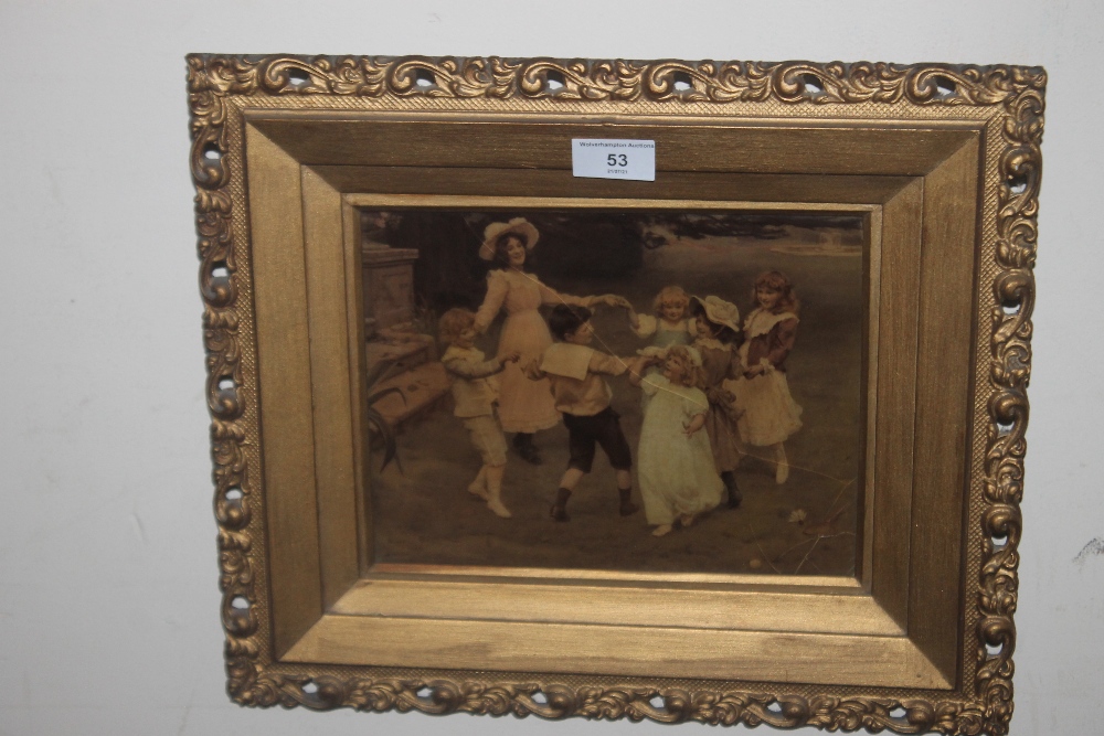 A FRAMED AND GLAZED CHRYSTOLEUM, depicting children doing ring of roses 39 x 33 cm