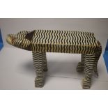 A WOODEN STOOL IN THE FORM OF A BENGAL TIGER
