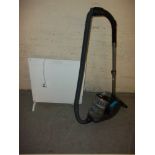 A VAX HOOVER AND A PANEL WALL HEATER