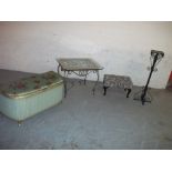 A WICKER KRAFT LOOM STYLE BLANKET CHEST, A FOOTSTOOL, A GLASS SIDE TABLE, A WROUGHT IRON STAND AND