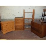 THREE CHESTS OF DRAWERS AND A PINE STORAGE SHELF