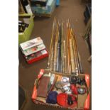 A COLLECTION OF VINTAGE FISHING RODS AND ACCESSORIES